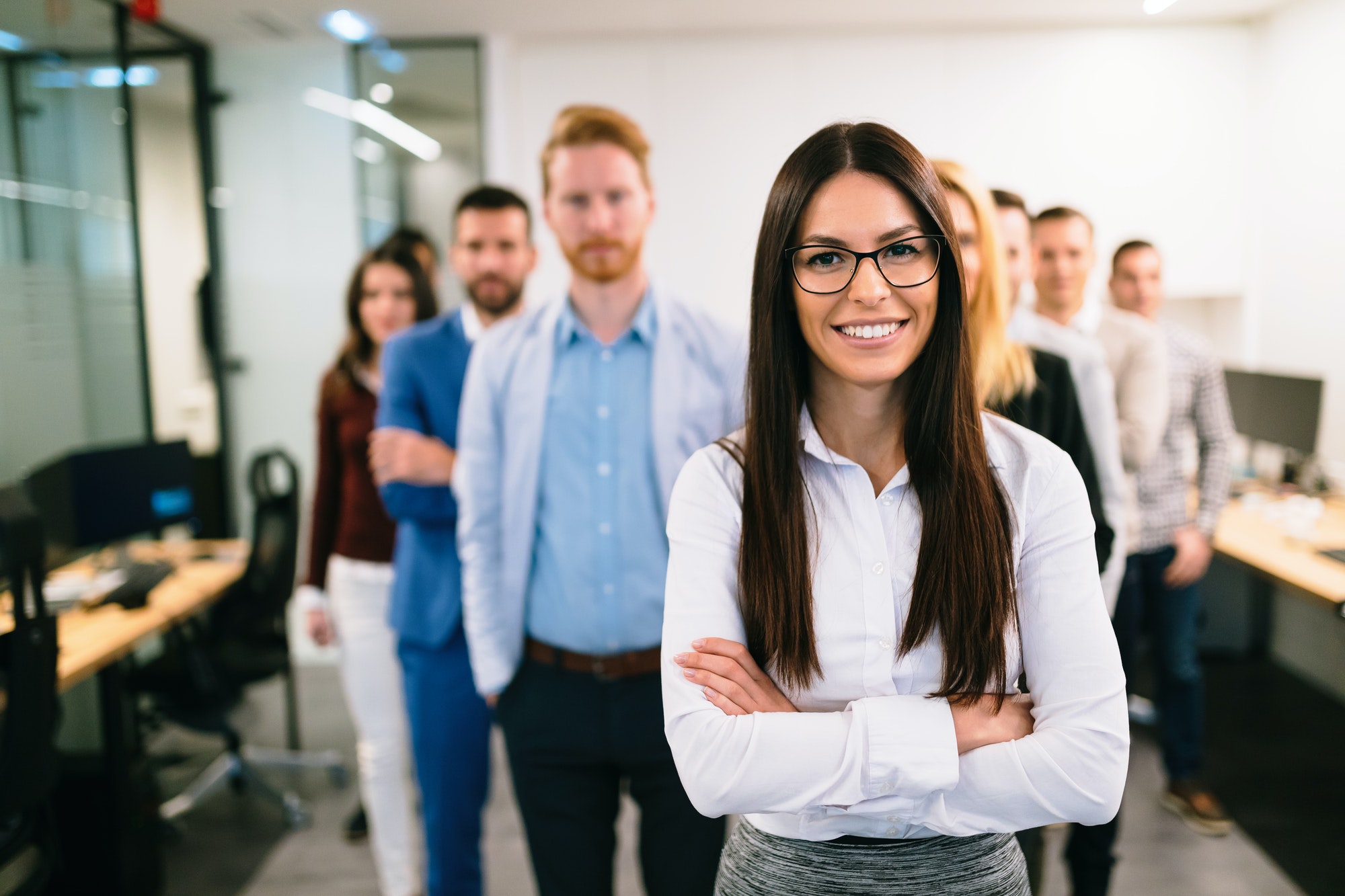Portrait of business team posing in office